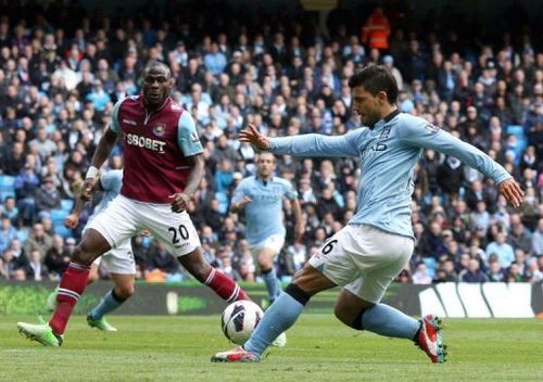 Manchester City's Sergio Aguero shoots at West Ham's goal in Manchester on April 27, 2013