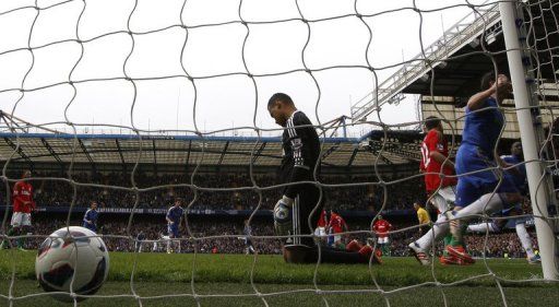 Frank Lampard strokes home a penalty to give Chelsea the lead against Swansea City on April 28, 2013