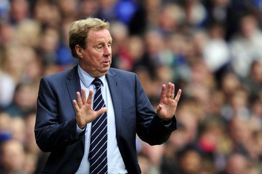QPR manager Harry Redknapp gestures to his players during the match against Reading on April 28, 2013