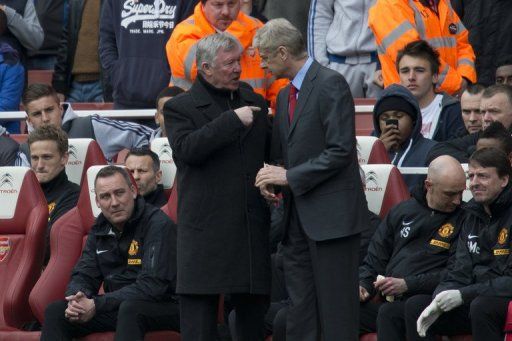 Arsenal manager Arsene Wenger (R) and Manchester United boss Alex Ferguson before kick-off on April 28, 2013