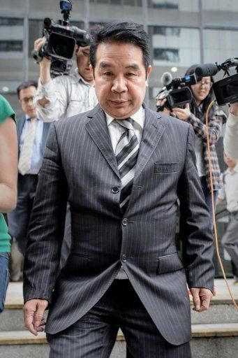 Birmingham City owner Carson Yeung leaves the Wanchai district court in Hong Kong on April 29, 2013