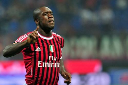 AC Milan's Clarence Seedorf celebrates after scoring against Cesena at the San Siro in Milan on September 24, 2011