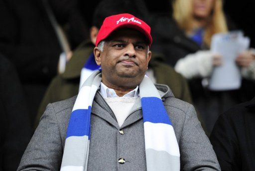 QPR owner Tony Fernandes watches the Premier League match against Fulham at Loftus Road, on December 15, 2012