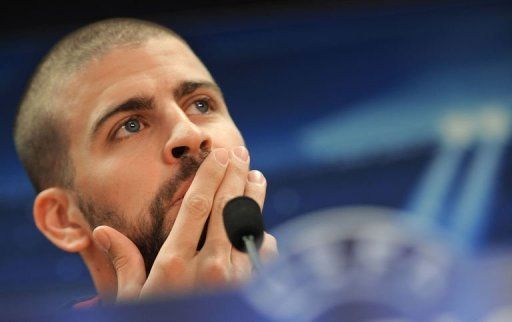 Barcelona&#039;s defender Gerard Pique takes part in a press conference in Sant Joan Despi, on April 30, 2013