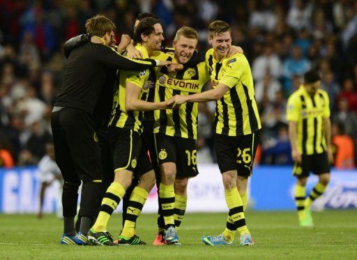 Dortmund&#039;s Lukasz Piszczek (R), Jakub 
