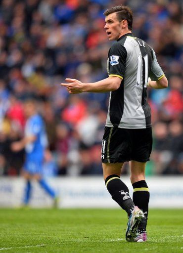 Tottenham&#039;s Gareth Bale gestures to the assistant referee after being caught offside, on April 27, 2013