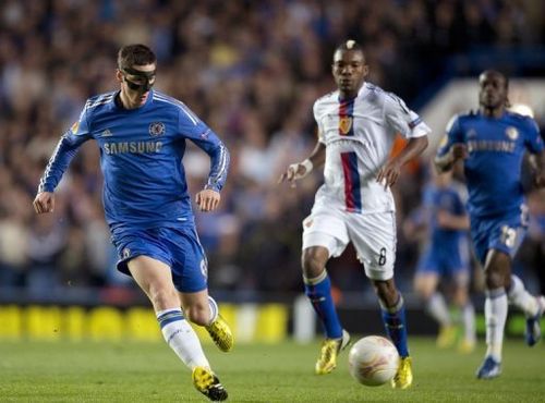 Chelsea's Fernando Torres (L) and Basel's Geoffroy Serey Die are pictured during their match on May 2, 2013