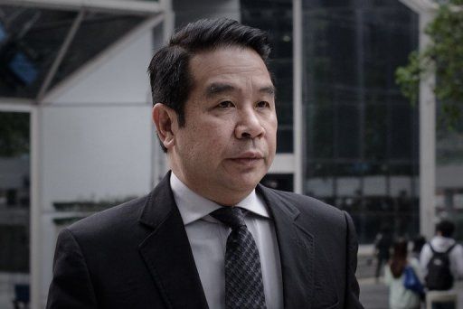 Birmingham City owner Carson Yeung arrives at court in Hong Kong on May 3, 2013