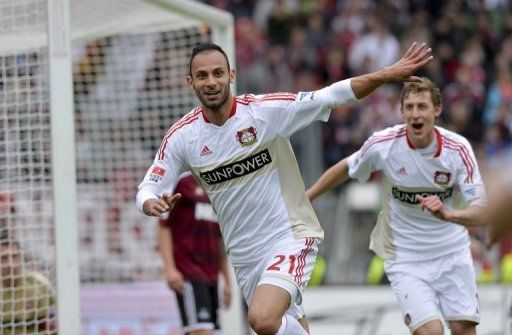 Leverkusen&#039;s defender Oemer Toprak (L) celebrates scoring in Nuremberg, southern Germany on May 4, 2013