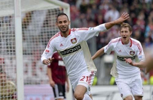 Leverkusen's defender Oemer Toprak (L) celebrates scoring in Nuremberg, southern Germany on May 4, 2013