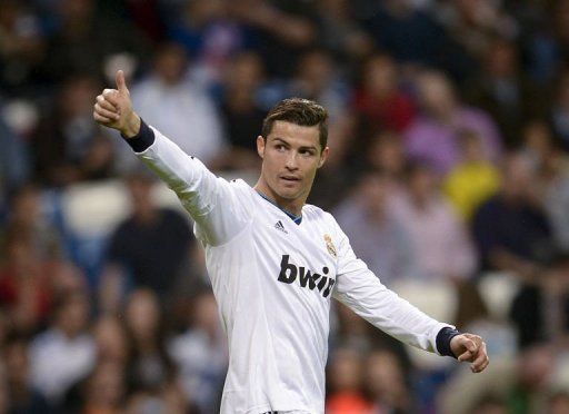 Real Madrid&#039;s forward Cristiano Ronaldo celebrates scoring in Madrid on May 4, 2013
