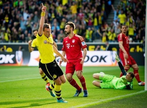 Dortmund's Kevin Grosskreutz celebrates scoring a goal in Dortmund on May 4, 2013