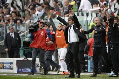 Juventus' coach Antonio Conte celebrates on May 5, 2013 at the Alps stadium in Turin