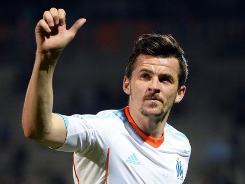 Joey Barton waves at the end of Marseille's game against Bordeaux in Marseille on April 5, 2013