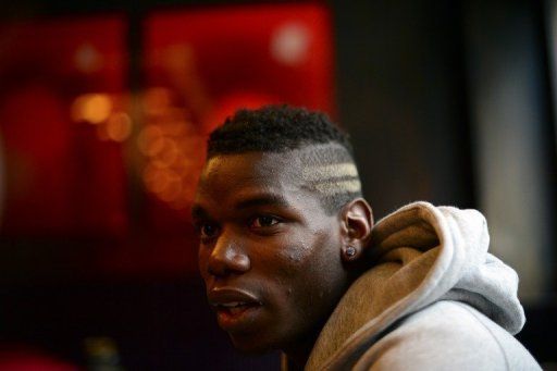 Juventus&#039; French midfielder Paul Pogba reacts during an interview with AFP on April 22, 2013 in Turin