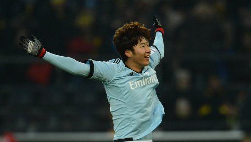 Hamburg&#039;s Son Heung-Min celebrates during the Bundesliga match against Borussia Dortmund on February 9, 2013