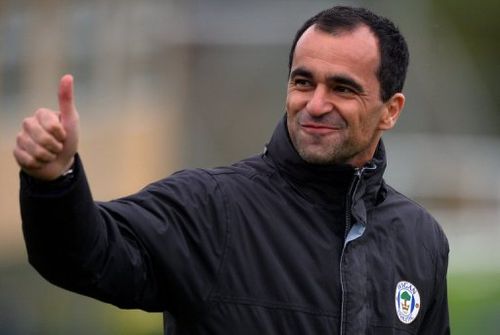 Wigan Athletic's manager Roberto Martinez arrives to take part in a training session on May 10, 2013