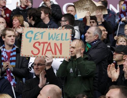 Supporters support Aston Villa's captain, Bulgarian Stiliyan Petrov at Villa Park, Birmingham, March 31, 2012