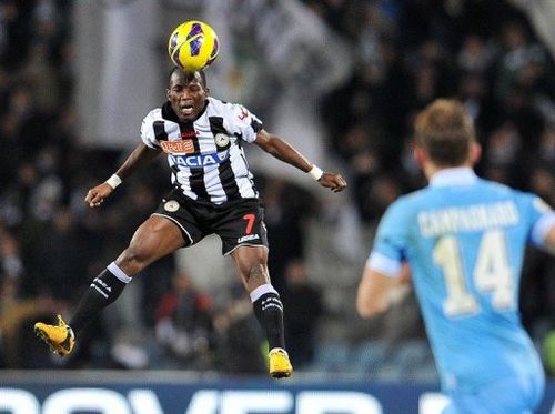 Udinese's Emmanuel Agyemang Badu heads the ball during a Serie A  match against Napoli on February 25, 2013