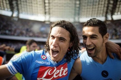 Napoli's Edinson Cavani (L) celebrates with Miguel Angel Britos on May 12, 2013 at San Paolo Stadium