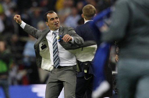Wigan Athletic manager Roberto Martinez celebrates after winning the FA Cup final against Man City on May 11, 2013