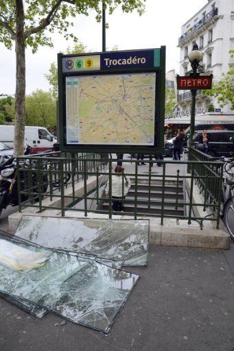 Broken glass outside Trocadero metro station on May 14, 2013 after Paris Saint Germain fans thronged the esplanade