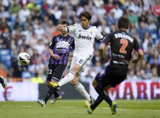 Kaka (centre) takes a shot for Real Madrid against Valladolid at the Santiago Bernabeu Stadium in Madrid on May 4 , 2013