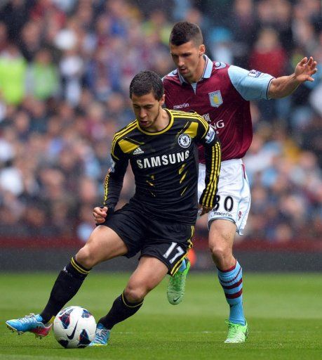 Chelsea midfielder Eden Hazard (L) is pictured during their Premier League match against Aston Villa on May 11, 2013