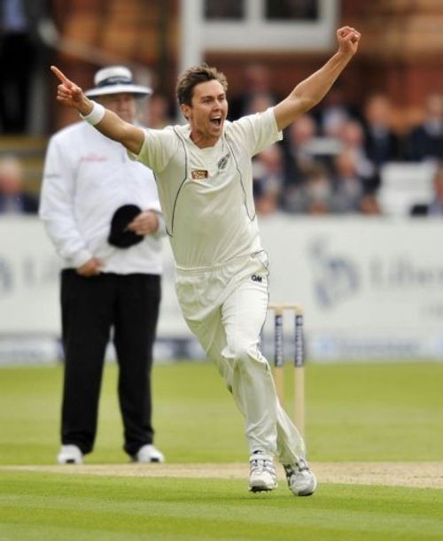 New Zealand's Trent Boult celebrates the wicket of England's Jonathan Trott at Lord's on May 16, 2013