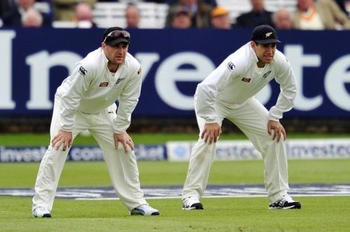 Brendon McCullum (L) and Ross Taylor stand in the slips at Lord's on May 17, 2013