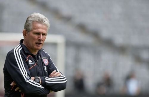 Bayern Munich's German head coach Jupp Heynckes gives instructions to his players in Munich, May 14, 2013