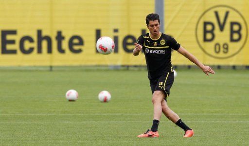 Dortmund&#039;s midfielder Nuri Sahin takes part in a training session in Dortmund, Germany on May 15, 2013