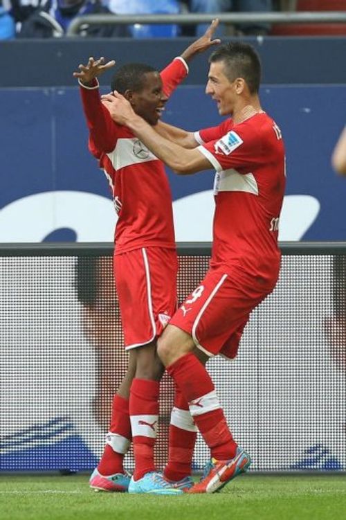 Stuttgart's Vedad Ibisevic and Ibrahima Traore (L) celebrate scoring against Schalke inÂ Gelsenkirchen,Â May 11, 2013