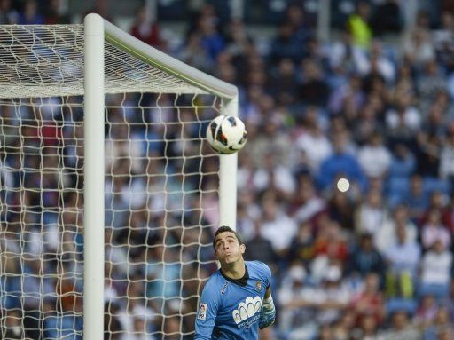 Valladolid&#039;s goalkeeper Jaime Jimenez eyes the ball during their match at Real Madrid, on May 4, 2013