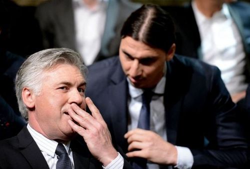 Carlo Ancelotti (L) speaks with Paris Saint-Germain's Zlatan Ibrahimovic on May 19, 2013 in Paris