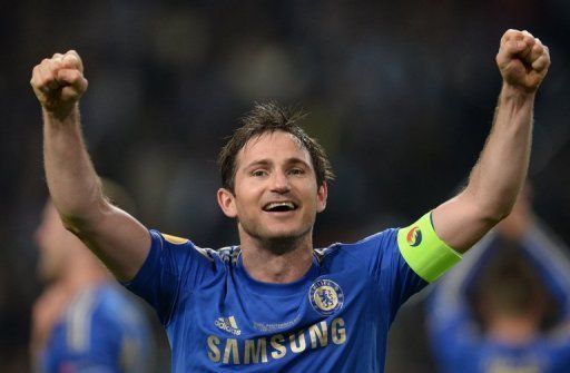 Frank Lampard celebrates after Chelsea won the UEFA Europa League final against Benfica in Amsterdam, on May 15, 2013