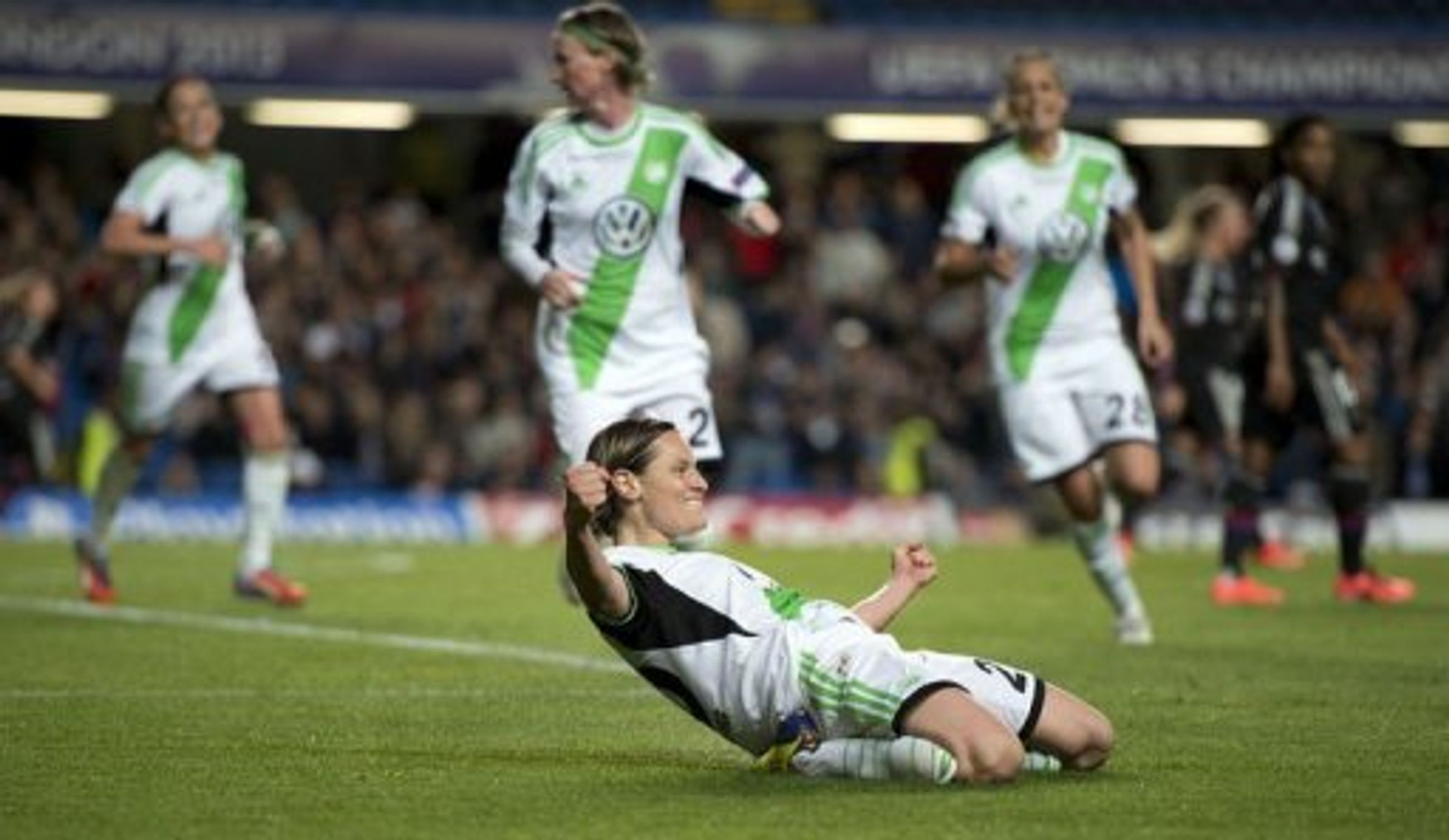 Wolfsburg&#039;s Martina Muller (C) celebrates at Stamford Bridge in London on May 23, 2013