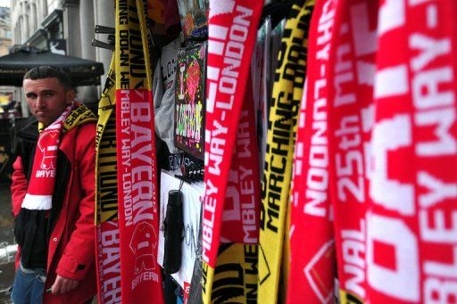 Bayern Munich and Borussia Dortmund scarves are displayed for sale in central London on May 24, 2013