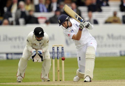 Joe Root (right) plays a shot during the first Test against New Zealand in London on May 16, 2013