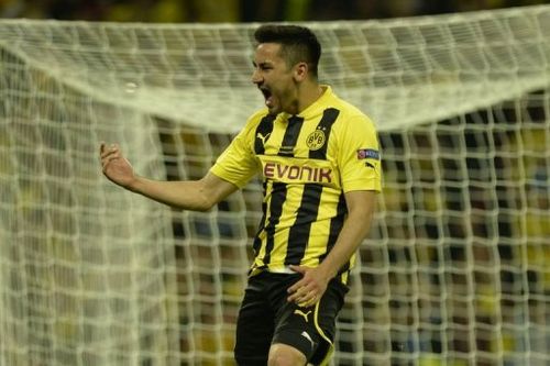 Borussia Dortmund's midfielder Ilkay Gundogan celebrates scoring his penalty at Wembley Stadium in London, May 25, 2013