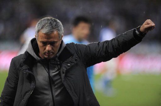 Real Madrid&#039;s Portuguese coach Jose Mourinho leaves the field in San Sebastian on May 26, 2013