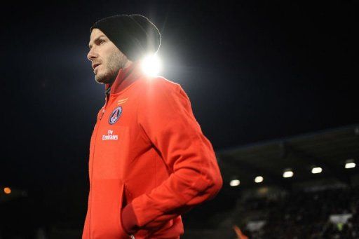 Paris Saint-Germain&#039;s David Beckham looks on after the match on May 26, 2013 at the Moustoir stadium in Lorient