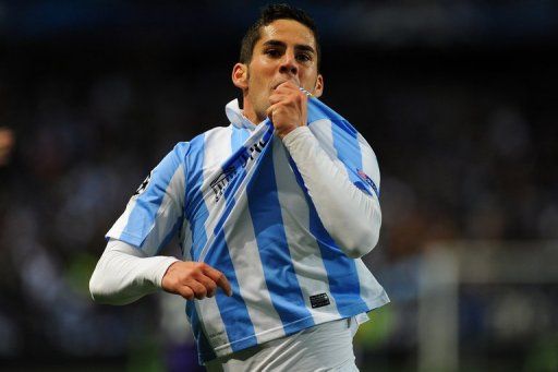 Isco celebrates after scoring at La Rosaleda stadium in Malaga on March 13, 2013