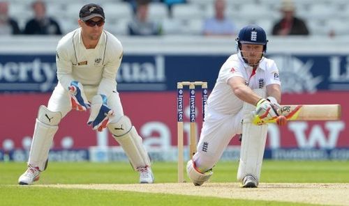 England's Ian Bell (R) plays a shot as New Zealand's Brendon McCullum looks on during the second Test on May 27, 2013