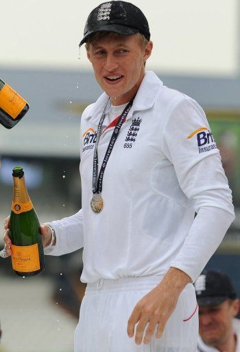 England&#039;s Joe Root celebrates a series win on the fifth day of the second Test against New Zealand on May 28, 2013