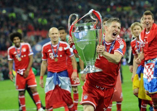 Bayern Munich players celebrate after their Champions League victory over Borussia Dortmund at Wembley on May 25, 2013