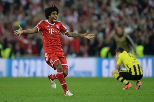 Dante celebrates at the final whistle at Wembley Stadium in London on May 25, 2013