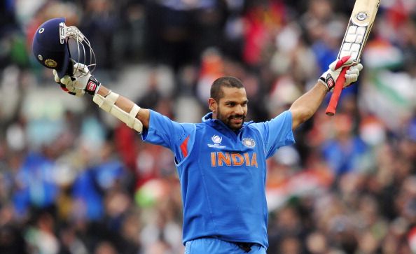 India&#039;s Shikhar Dhawan celebrates his century (100 Runs)  during the 2013 ICC Champions Trophy One Day International (ODI) cricket match between India and West Indies at The Oval in London, England on June 11, 2013.