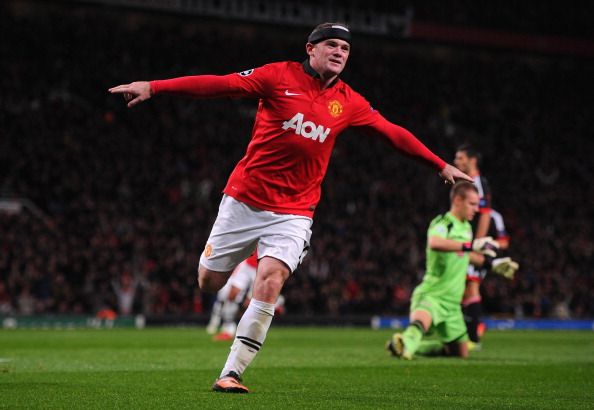 Wayne Rooney  celebrates scoring his team&#039;s third goal during the UEFA Champions League Group A match between Manchester United and Bayer Leverkusen at Old Trafford on September 17, 2013 in Manchester, England.  (Getty Images)