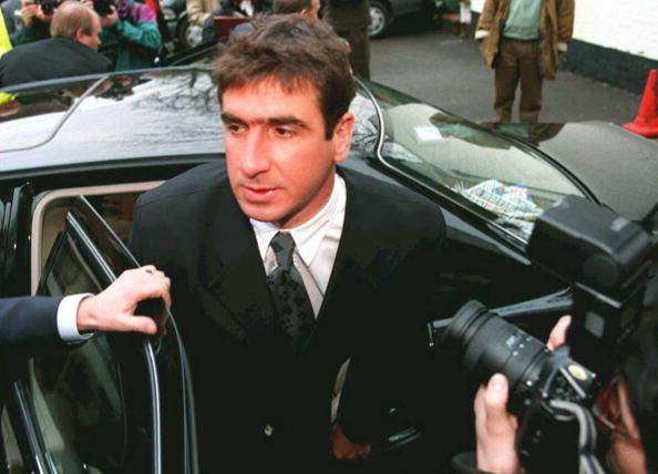 Eric Cantona arrives at a hotel in Saint Albans in London to appear before a Football Association disciplinary commission